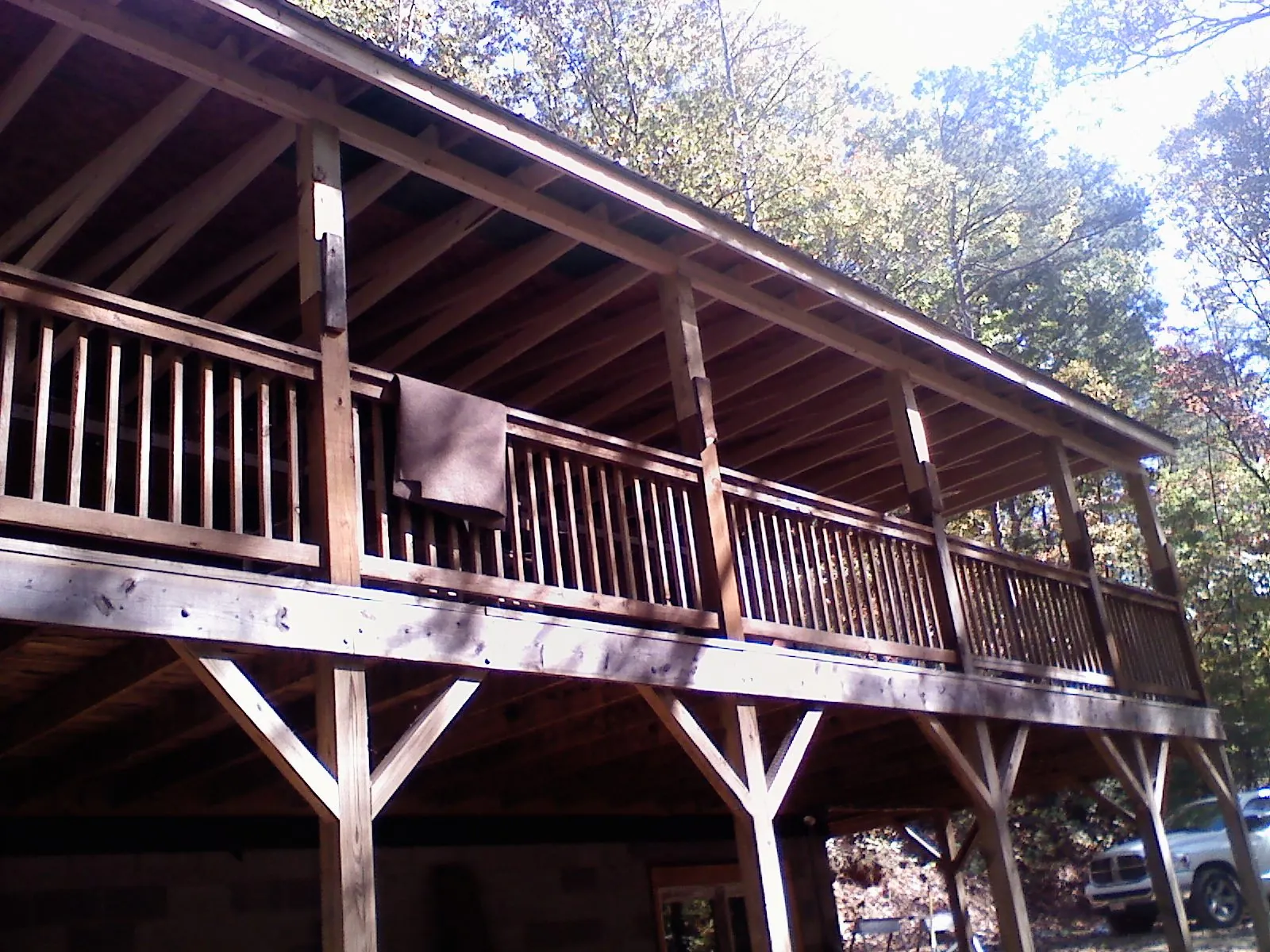 Timber framing under a new elevated porch and deck — Roof Leak Repair in Zebulon by Roofing Brothers